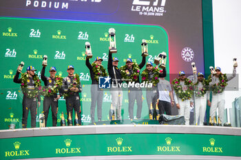 2024-06-16 - Podium, 12 STEVENS Will (gbr), ILOTT Callum (gbr), NATO Norman (fra), Hertz Team Jota, Porsche 963 #12, Hypercar, FIA WEC, 38 RASMUSSEN Oliver (dnk), HANSON Philip (gbr), BUTTON Jenson (gbr), Hertz Team Jota, Porsche 963 #38, Hypercar, FIA WEC, 99 TINCKNELL Harry (gbr), JANI Neel (swi), ANDLAUER Julien (fra), Proton Competition, Porsche 963 #99, Hypercar, FIA WEC, during the podium of the 2024 24 Hours of Le Mans, 4th round of the 2024 FIA World Endurance Championship, on the Circuit des 24 Heures du Mans, from June 15 to 16, 2024 in Le Mans, France - 24 HEURES DU MANS 2024 - PODIUM - ENDURANCE - MOTORS