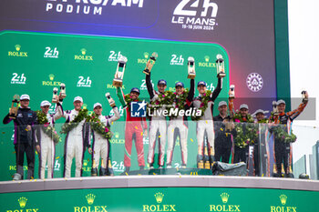 2024-06-16 - Podium, 183 PERRODO François (fra), BARNICOAT Ben (gbr), VARRONE Nicolas (arg), AF Corse, Oreca 07 - Gibson #183, LMP2 PRO/AM, 14 HYETT PJ (usa), DELETRAZ Louis (swi), QUINN Alex (gbr), AO by TF, Oreca 07 - Gibson #14, LMP2 PRO/AM, 33 MATTSCHULL Alexander (ger), BINDER René (aut), HORR Laurents (ger), DKR Engineering, Oreca 07 - Gibson #33, LMP2 PRO/AM, during the podium of the 2024 24 Hours of Le Mans, 4th round of the 2024 FIA World Endurance Championship, on the Circuit des 24 Heures du Mans, from June 15 to 16, 2024 in Le Mans, France - 24 HEURES DU MANS 2024 - PODIUM - ENDURANCE - MOTORS