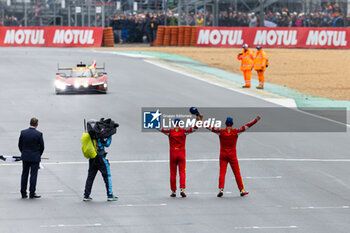 2024-06-16 - MOLINA Miguel (spa), Ferrari AF Corse, Ferrari 499P #50, Hypercar, FIA WEC, portrait, FUOCO Antonio (ita), Ferrari AF Corse, Ferrari 499P #50, Hypercar, FIA WEC, portrait, NIELSEN Nicklas (dnk), Ferrari AF Corse, Ferrari 499P #50, Hypercar, FIA WEC, portrait during the podium of the 2024 24 Hours of Le Mans, 4th round of the 2024 FIA World Endurance Championship, on the Circuit des 24 Heures du Mans, from June 15 to 16, 2024 in Le Mans, France - 24 HEURES DU MANS 2024 - PODIUM - ENDURANCE - MOTORS