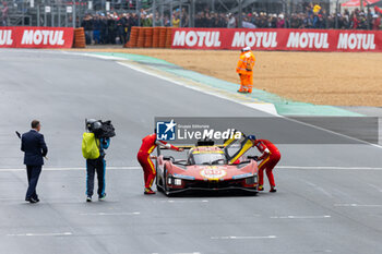 2024-06-16 - MOLINA Miguel (spa), Ferrari AF Corse, Ferrari 499P #50, Hypercar, FIA WEC, portrait, FUOCO Antonio (ita), Ferrari AF Corse, Ferrari 499P #50, Hypercar, FIA WEC, portrait, NIELSEN Nicklas (dnk), Ferrari AF Corse, Ferrari 499P #50, Hypercar, FIA WEC, portrait during the podium of the 2024 24 Hours of Le Mans, 4th round of the 2024 FIA World Endurance Championship, on the Circuit des 24 Heures du Mans, from June 15 to 16, 2024 in Le Mans, France - 24 HEURES DU MANS 2024 - PODIUM - ENDURANCE - MOTORS