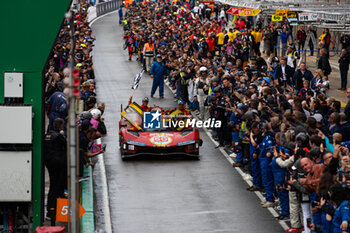 2024-06-16 - MOLINA Miguel (spa), Ferrari AF Corse, Ferrari 499P #50, Hypercar, FIA WEC, portrait, FUOCO Antonio (ita), Ferrari AF Corse, Ferrari 499P #50, Hypercar, FIA WEC, portrait, NIELSEN Nicklas (dnk), Ferrari AF Corse, Ferrari 499P #50, Hypercar, FIA WEC, portrait during the podium of the 2024 24 Hours of Le Mans, 4th round of the 2024 FIA World Endurance Championship, on the Circuit des 24 Heures du Mans, from June 15 to 16, 2024 in Le Mans, France - 24 HEURES DU MANS 2024 - PODIUM - ENDURANCE - MOTORS