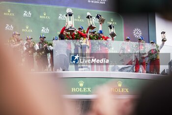 2024-06-16 - 50 FUOCO Antonio (ita), MOLINA Miguel (spa), NIELSEN Nicklas (dnk), Ferrari AF Corse, Ferrari 499P #50, Hypercar, FIA WEC, celebration during the podium of the 2024 24 Hours of Le Mans, 4th round of the 2024 FIA World Endurance Championship, on the Circuit des 24 Heures du Mans, from June 15 to 16, 2024 in Le Mans, France - 24 HEURES DU MANS 2024 - PODIUM - ENDURANCE - MOTORS