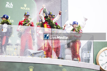 2024-06-16 - 50 FUOCO Antonio (ita), MOLINA Miguel (spa), NIELSEN Nicklas (dnk), Ferrari AF Corse, Ferrari 499P #50, Hypercar, FIA WEC, celebration during the podium of the 2024 24 Hours of Le Mans, 4th round of the 2024 FIA World Endurance Championship, on the Circuit des 24 Heures du Mans, from June 15 to 16, 2024 in Le Mans, France - 24 HEURES DU MANS 2024 - PODIUM - ENDURANCE - MOTORS