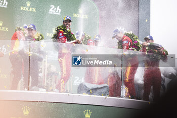 2024-06-16 - 50 FUOCO Antonio (ita), MOLINA Miguel (spa), NIELSEN Nicklas (dnk), Ferrari AF Corse, Ferrari 499P #50, Hypercar, FIA WEC, celebration during the podium of the 2024 24 Hours of Le Mans, 4th round of the 2024 FIA World Endurance Championship, on the Circuit des 24 Heures du Mans, from June 15 to 16, 2024 in Le Mans, France - 24 HEURES DU MANS 2024 - PODIUM - ENDURANCE - MOTORS