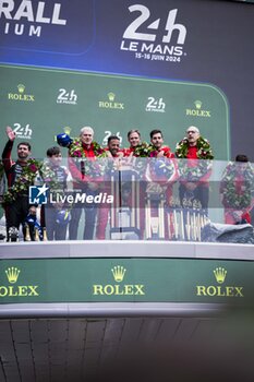 2024-06-16 - 50 FUOCO Antonio (ita), MOLINA Miguel (spa), NIELSEN Nicklas (dnk), Ferrari AF Corse, Ferrari 499P #50, Hypercar, FIA WEC, celebration during the podium of the 2024 24 Hours of Le Mans, 4th round of the 2024 FIA World Endurance Championship, on the Circuit des 24 Heures du Mans, from June 15 to 16, 2024 in Le Mans, France - 24 HEURES DU MANS 2024 - PODIUM - ENDURANCE - MOTORS