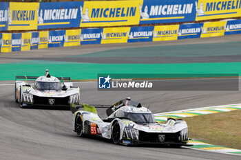 2024-07-12 - 93 JENSEN Mikkel (dnk), MULLER Nico (swi), VERGNE Jean-Eric (fra), Peugeot TotalEnergies, Peugeot 9x8 #93, Hypercar, action 94 DUVAL Loïc (fra), DI RESTA Paul (gbr), VANDOORNE Stoffel (bel), Peugeot TotalEnergies, Peugeot 9x8 #94, Hypercar, action during the 2024 Rolex 6 Hours of Sao Paulo, 5th round of the 2024 FIA World Endurance Championship, from July 12 to 14, 2024 on the Autódromo José Carlos Pace in Interlagos, Brazil - FIA WEC - 6 HOURS OF SAO PAULO 2024 - ENDURANCE - MOTORS