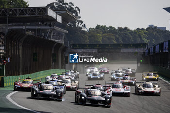 2024-07-14 - Start of the race, 07 CONWAY Mike (gbr), KOBAYASHI Kamui (jpn), DE VRIES Nyck (nld), Toyota Gazoo Racing, Toyota GR010 - Hybrid #07, Hypercar, 08 BUEMI Sébastien (swi), HARTLEY Brendon (nzl), HIRAKAWA Ryo (jpn), Toyota Gazoo Racing, Toyota GR010 - Hybrid #08, Hypercar, action during the 2024 Rolex 6 Hours of Sao Paulo, 5th round of the 2024 FIA World Endurance Championship, from July 12 to 14, 2024 on the Autódromo José Carlos Pace in Interlagos, Brazil - FIA WEC - 6 HOURS OF SAO PAULO 2024 - ENDURANCE - MOTORS