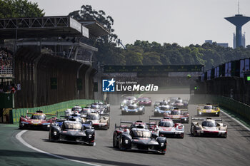 2024-07-14 - Start of the race, 07 CONWAY Mike (gbr), KOBAYASHI Kamui (jpn), DE VRIES Nyck (nld), Toyota Gazoo Racing, Toyota GR010 - Hybrid #07, Hypercar, 08 BUEMI Sébastien (swi), HARTLEY Brendon (nzl), HIRAKAWA Ryo (jpn), Toyota Gazoo Racing, Toyota GR010 - Hybrid #08, Hypercar, action during the 2024 Rolex 6 Hours of Sao Paulo, 5th round of the 2024 FIA World Endurance Championship, from July 12 to 14, 2024 on the Autódromo José Carlos Pace in Interlagos, Brazil - FIA WEC - 6 HOURS OF SAO PAULO 2024 - ENDURANCE - MOTORS