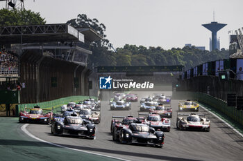 2024-07-14 - Start of the race, 07 CONWAY Mike (gbr), KOBAYASHI Kamui (jpn), DE VRIES Nyck (nld), Toyota Gazoo Racing, Toyota GR010 - Hybrid #07, Hypercar, 08 BUEMI Sébastien (swi), HARTLEY Brendon (nzl), HIRAKAWA Ryo (jpn), Toyota Gazoo Racing, Toyota GR010 - Hybrid #08, Hypercar, action during the 2024 Rolex 6 Hours of Sao Paulo, 5th round of the 2024 FIA World Endurance Championship, from July 12 to 14, 2024 on the Autódromo José Carlos Pace in Interlagos, Brazil - FIA WEC - 6 HOURS OF SAO PAULO 2024 - ENDURANCE - MOTORS