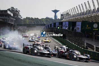 2024-07-14 - Start of the race, 07 CONWAY Mike (gbr), KOBAYASHI Kamui (jpn), DE VRIES Nyck (nld), Toyota Gazoo Racing, Toyota GR010 - Hybrid #07, Hypercar, 08 BUEMI Sébastien (swi), HARTLEY Brendon (nzl), HIRAKAWA Ryo (jpn), Toyota Gazoo Racing, Toyota GR010 - Hybrid #08, Hypercar, action during the 2024 Rolex 6 Hours of Sao Paulo, 5th round of the 2024 FIA World Endurance Championship, from July 12 to 14, 2024 on the Autódromo José Carlos Pace in Interlagos, Brazil - FIA WEC - 6 HOURS OF SAO PAULO 2024 - ENDURANCE - MOTORS