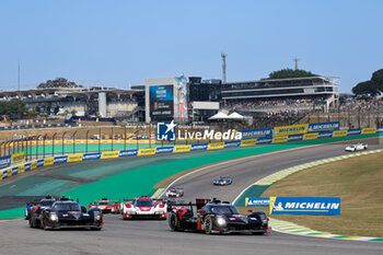 2024-07-14 - depart, start, 07 CONWAY Mike (gbr), KOBAYASHI Kamui (jpn), DE VRIES Nyck (nld), Toyota Gazoo Racing, Toyota GR010 - Hybrid #07, Hypercar, action, 08 BUEMI Sébastien (swi), HARTLEY Brendon (nzl), HIRAKAWA Ryo (jpn), Toyota Gazoo Racing, Toyota GR010 - Hybrid #08, Hypercar, action during the 2024 Rolex 6 Hours of Sao Paulo, 5th round of the 2024 FIA World Endurance Championship, from July 12 to 14, 2024 on the Autódromo José Carlos Pace in Interlagos, Brazil - FIA WEC - 6 HOURS OF SAO PAULO 2024 - ENDURANCE - MOTORS