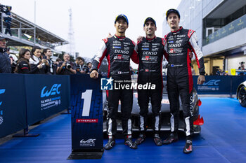 2024-07-14 - 08 BUEMI Sébastien (swi), HARTLEY Brendon (nzl), HIRAKAWA Ryo (jpn), Toyota Gazoo Racing, Toyota GR010 - Hybrid #08, Hypercar, celebrating their win during the 2024 Rolex 6 Hours of Sao Paulo, 5th round of the 2024 FIA World Endurance Championship, from July 12 to 14, 2024 on the Autódromo José Carlos Pace in Interlagos, Brazil - FIA WEC - 6 HOURS OF SAO PAULO 2024 - ENDURANCE - MOTORS