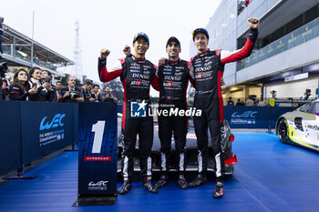 2024-07-14 - 08 BUEMI Sébastien (swi), HARTLEY Brendon (nzl), HIRAKAWA Ryo (jpn), Toyota Gazoo Racing, Toyota GR010 - Hybrid #08, Hypercar, celebrating their win during the 2024 Rolex 6 Hours of Sao Paulo, 5th round of the 2024 FIA World Endurance Championship, from July 12 to 14, 2024 on the Autódromo José Carlos Pace in Interlagos, Brazil - FIA WEC - 6 HOURS OF SAO PAULO 2024 - ENDURANCE - MOTORS