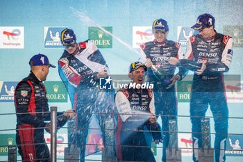 2024-07-14 - 08 BUEMI Sébastien (swi), HARTLEY Brendon (nzl), HIRAKAWA Ryo (jpn), Toyota Gazoo Racing, Toyota GR010 - Hybrid #08, Hypercar, podium, portrait during the 2024 Rolex 6 Hours of Sao Paulo, 5th round of the 2024 FIA World Endurance Championship, from July 12 to 14, 2024 on the Autódromo José Carlos Pace in Interlagos, Brazil - FIA WEC - 6 HOURS OF SAO PAULO 2024 - ENDURANCE - MOTORS