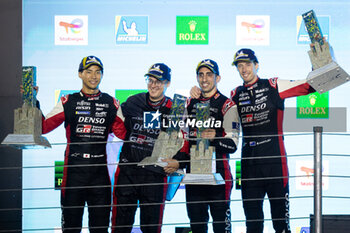 2024-07-14 - BUEMI Sébastien (swi), HARTLEY Brendon (nzl), HIRAKAWA Ryo (jpn), Toyota Gazoo Racing, Toyota GR010 - Hybrid #08, Hypercar, portrait at the podium during the 2024 Rolex 6 Hours of Sao Paulo, 5th round of the 2024 FIA World Endurance Championship, from July 11 to 14, 2024 on the Autódromo José Carlos Pace in Interlagos, Brazil - FIA WEC - 6 HOURS OF SAO PAULO 2024 - ENDURANCE - MOTORS