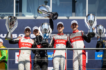 2024-08-25 - EDGAR Jonny (gbr), DELETRAZ Louis (swi), KUBICA Robert (pol), AO by TF, Oreca 07 - Gibson, portrait at the podium during the 4 Hours of Imola 2024, 4th round of the 2024 European Le Mans Series on the Circuit de Spa-Francorchamps from August 23 to 25, 2024 in Stavelot, Belgium - AUTO - ELMS - 4 HOURS OF SPA-FRANCORCHAMPS 2024 - ENDURANCE - MOTORS