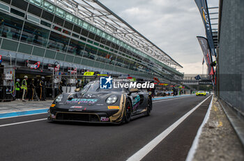 2024-09-21 - Ayhancan GUVEN,Kevin ESTRE,Dorian BOCCOLACCI, of a team ,on a Schumacher CLRT, Porsche 911 GT3 R (992) in a pitlane during Fanatec GT Word Challenge in Monza - FANATEC GT ENDURANCE CUP - ENDURANCE - MOTORS