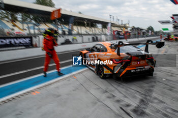 2024-09-21 - Jens KLINGMANN,Ahmad AL HARTHY,Sam DE HAAN, of a team OQ By OMAN RACING, on a BMW M4 GT3 exit to pitale during Fanatec GT Word Challenge in Monza - FANATEC GT ENDURANCE CUP - ENDURANCE - MOTORS