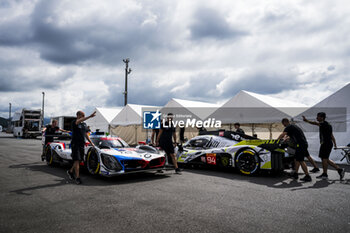 2024-09-12 - 20 VAN DER LINDE Sheldon (zaf), FRIJNS Robin (nld), RAST René (ger), BMW M Team WRT, BMW Hybrid V8 #20, Hypercar, 94 DUVAL Loïc (fra), DI RESTA Paul (gbr), VANDOORNE Stoffel (bel), Peugeot TotalEnergies, Peugeot 9x8 #94, Hypercar, scrutineering, verifications techniques, during the 2024 6 Hours of Fuji, 7th round of the 2024 FIA World Endurance Championship, from September 13 to 15, 2024 on the Fuji Speedway in Oyama, Shizuoka, Japan - FIA WEC - 6 HOURS OF FUJI 2024 - ENDURANCE - MOTORS