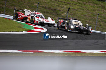 2024-09-13 - 08 BUEMI Sébastien (swi), HARTLEY Brendon (nzl), HIRAKAWA Ryo (jpn), Toyota Gazoo Racing, Toyota GR010 - Hybrid #08, Hypercar, 06 ESTRE Kevin (fra), LOTTERER André (ger), VANTHOOR Laurens (bel), Porsche Penske Motorsport, Porsche 963 #06, Hypercar, action during the 2024 6 Hours of Fuji, 7th round of the 2024 FIA World Endurance Championship, from September 13 to 15, 2024 on the Fuji Speedway in Oyama, Shizuoka, Japan - FIA WEC - 6 HOURS OF FUJI 2024 - ENDURANCE - MOTORS