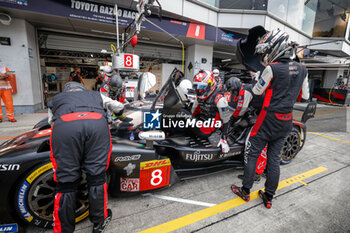 2024-09-13 - 08 BUEMI Sébastien (swi), HARTLEY Brendon (nzl), HIRAKAWA Ryo (jpn), Toyota Gazoo Racing, Toyota GR010 - Hybrid #08, Hypercar, stand, pitlane, during the 2024 6 Hours of Fuji, 7th round of the 2024 FIA World Endurance Championship, from September 13 to 15, 2024 on the Fuji Speedway in Oyama, Shizuoka, Japan - FIA WEC - 6 HOURS OF FUJI 2024 - ENDURANCE - MOTORS