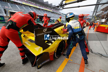 2024-09-13 - 83 KUBICA Robert (pol), SHWARTZMAN Robert (isr), YE Yifei (chn), AF Corse, Ferrari 499P #83, Hypercar, stand, pitlane, during the 2024 6 Hours of Fuji, 7th round of the 2024 FIA World Endurance Championship, from September 13 to 15, 2024 on the Fuji Speedway in Oyama, Shizuoka, Japan - FIA WEC - 6 HOURS OF FUJI 2024 - ENDURANCE - MOTORS