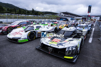 2024-09-15 - 94 DUVAL Loïc (fra), DI RESTA Paul (gbr), VANDOORNE Stoffel (bel), Peugeot TotalEnergies, Peugeot 9x8 #94, Hypercar, ambiance parc fermé during the 2024 6 Hours of Fuji, 7th round of the 2024 FIA World Endurance Championship, from September 13 to 15, 2024 on the Fuji Speedway in Oyama, Shizuoka, Japan - FIA WEC - 6 HOURS OF FUJI 2024 - ENDURANCE - MOTORS