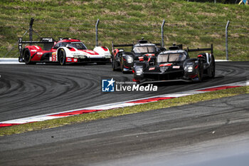 2024-09-15 - 07 CONWAY Mike (gbr), KOBAYASHI Kamui (jpn), DE VRIES Nyck (nld), Toyota Gazoo Racing, Toyota GR010 - Hybrid #07, Hypercar, 08 BUEMI Sébastien (swi), HARTLEY Brendon (nzl), HIRAKAWA Ryo (jpn), Toyota Gazoo Racing, Toyota GR010 - Hybrid #08, Hypercar, 05 CAMPBELL Matt (aus), CHRISTENSEN Michael (dnk), MAKOWIECKI Frédéric (fra), Porsche Penske Motorsport, Porsche 963 #05, Hypercar, action during the 2024 6 Hours of Fuji, 7th round of the 2024 FIA World Endurance Championship, from September 13 to 15, 2024 on the Fuji Speedway in Oyama, Shizuoka, Japan - FIA WEC - 6 HOURS OF FUJI 2024 - ENDURANCE - MOTORS