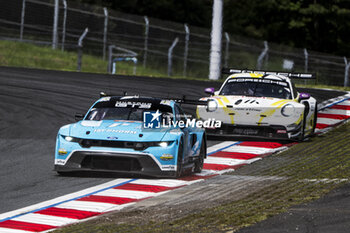 2024-09-15 - 77 BARKER Ben (gbr), HARDWICK Ryan (usa), ROBICHON Zacharie (can), Proton Competition, Ford Mustang GT3 #77, LM GT3, 92 MALYKHIN Aliaksandr (kna), STURM Joel (ger), BACHLER Klaus (aut), Manthey Purerxcing, Porsche 911 GT3 R #92, LM GT3, action during the 2024 6 Hours of Fuji, 7th round of the 2024 FIA World Endurance Championship, from September 13 to 15, 2024 on the Fuji Speedway in Oyama, Shizuoka, Japan - FIA WEC - 6 HOURS OF FUJI 2024 - ENDURANCE - MOTORS