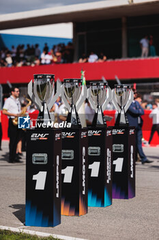 2024-10-19 - Trophy Trophies on the starting grid, grille de depart, during the 4 Hours of Portimao 2024, 6th round of the 2024 European Le Mans Series on the Algarve International Circuit from October 16 to 19, 2024 in Portimao, Portugal - AUTO - ELMS - 4 HOURS OF PORTIMAO 2024 - ENDURANCE - MOTORS