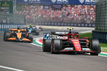 2024-05-19 - The start of the F1 Race Carlos Sainz Ferrari Spa Scuderia Ferrari - FORMULA 1 MSC CRUISES GRAN PREMIO DELL'EMILIA-ROMAGNA 2024 - RACE - FORMULA 1 - MOTORS