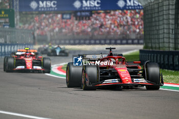 2024-05-19 - The start of the F1 Race Carlos Sainz Ferrari Spa Scuderia Ferrari and Charles Leclerc Ferrari Spa Scuderia Ferrari - FORMULA 1 MSC CRUISES GRAN PREMIO DELL'EMILIA-ROMAGNA 2024 - RACE - FORMULA 1 - MOTORS