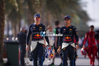 2024-02-21 - VERSTAPPEN Max (ned), Red Bull Racing RB20, PEREZ Sergio (mex), Red Bull Racing RB20, portrait during the Formula 1 Aramco pre-season testing 2024 of the 2024 FIA Formula One World Championship from February 21 to 23, 2024 on the Bahrain International Circuit, in Sakhir, Bahrain - F1 - PRE-SEASON TESTING 2024 - BAHRAIN - FORMULA 1 - MOTORS