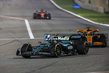 2024-02-23 - 14 ALONSO Fernando (spa), Aston Martin F1 Team AMR24 and 81 PIASTRI Oscar (aus), McLaren F1 Team MCL38, action during the Formula 1 Aramco pre-season testing 2024 of the 2024 FIA Formula One World Championship from February 21 to 23, 2024 on the Bahrain International Circuit, in Sakhir, Bahrain - F1 - PRE-SEASON TESTING 2024 - BAHRAIN - FORMULA 1 - MOTORS