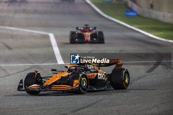 2024-02-23 - 81 PIASTRI Oscar (aus), McLaren F1 Team MCL38 and 16 LECLERC Charles (mco), Scuderia Ferrari SF-24, action during the Formula 1 Aramco pre-season testing 2024 of the 2024 FIA Formula One World Championship from February 21 to 23, 2024 on the Bahrain International Circuit, in Sakhir, Bahrain - F1 - PRE-SEASON TESTING 2024 - BAHRAIN - FORMULA 1 - MOTORS