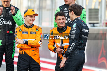 2024-03-02 - PIASTRI Oscar (aus), McLaren F1 Team MCL38, NORRIS Lando (gbr), McLaren F1 Team MCL38, RUSSELL George (gbr), Mercedes AMG F1 Team W15, portrait, during the Formula 1 Gulf Air Bahrain Grand Prix 2024, 1st round of the 2024 FIA Formula One World Championship from February 29 to March 2, 2024 on the Bahrain International Circuit, in Sakhir, Bahrain - F1 - BAHRAIN GRAND PRIX 2024 - FORMULA 1 - MOTORS