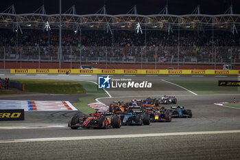 2024-03-02 - 16 LECLERC Charles (mco), Scuderia Ferrari SF-24, 63 RUSSELL George (gbr), Mercedes AMG F1 Team W15, 11 PEREZ Sergio (mex), Red Bull Racing RB20, action, start of the race, depart, during the Formula 1 Gulf Air Bahrain Grand Prix 2024, 1st round of the 2024 FIA Formula One World Championship from February 29 to March 2, 2024 on the Bahrain International Circuit, in Sakhir, Bahrain - F1 - BAHRAIN GRAND PRIX 2024 - FORMULA 1 - MOTORS