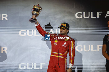 2024-03-02 - SAINZ Carlos (spa), Scuderia Ferrari SF-24, portrait podium trophy during the Formula 1 Gulf Air Bahrain Grand Prix 2024, 1st round of the 2024 FIA Formula One World Championship from February 29 to March 2, 2024 on the Bahrain International Circuit, in Sakhir, Bahrain - F1 - BAHRAIN GRAND PRIX 2024 - FORMULA 1 - MOTORS