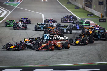 2024-03-02 - start of the race, depart, 01 VERSTAPPEN Max (nld), Red Bull Racing RB20, 16 LECLERC Charles (mco), Scuderia Ferrari SF-24, 63 RUSSELL George (gbr), Mercedes AMG F1 Team W15, 11 PEREZ Sergio (mex), Red Bull Racing RB20, action during the Formula 1 Gulf Air Bahrain Grand Prix 2024, 1st round of the 2024 FIA Formula One World Championship from February 29 to March 2, 2024 on the Bahrain International Circuit, in Sakhir, Bahrain - F1 - BAHRAIN GRAND PRIX 2024 - FORMULA 1 - MOTORS
