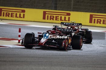 2024-03-02 - 16 LECLERC Charles (mco), Scuderia Ferrari SF-24, action 55 SAINZ Carlos (spa), Scuderia Ferrari SF-24, action during the Formula 1 Gulf Air Bahrain Grand Prix 2024, 1st round of the 2024 FIA Formula One World Championship from February 29 to March 2, 2024 on the Bahrain International Circuit, in Sakhir, Bahrain - F1 - BAHRAIN GRAND PRIX 2024 - FORMULA 1 - MOTORS