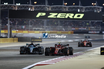 2024-03-02 - 55 SAINZ Carlos (spa), Scuderia Ferrari SF-24, action 63 RUSSELL George (gbr), Mercedes AMG F1 Team W15, action during the Formula 1 Gulf Air Bahrain Grand Prix 2024, 1st round of the 2024 FIA Formula One World Championship from February 29 to March 2, 2024 on the Bahrain International Circuit, in Sakhir, Bahrain - F1 - BAHRAIN GRAND PRIX 2024 - FORMULA 1 - MOTORS