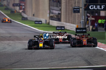 2024-03-02 - 11 PEREZ Sergio (mex), Red Bull Racing RB20, 16 LECLERC Charles (mco), Scuderia Ferrari SF-24, action during the Formula 1 Gulf Air Bahrain Grand Prix 2024, 1st round of the 2024 FIA Formula One World Championship from February 29 to March 2, 2024 on the Bahrain International Circuit, in Sakhir, Bahrain - F1 - BAHRAIN GRAND PRIX 2024 - FORMULA 1 - MOTORS