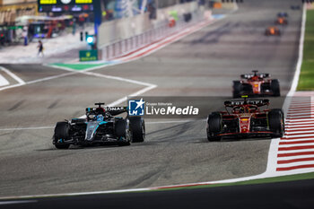 2024-03-02 - 63 RUSSELL George (gbr), Mercedes AMG F1 Team W15, 55 SAINZ Carlos (spa), Scuderia Ferrari SF-24, action during the Formula 1 Gulf Air Bahrain Grand Prix 2024, 1st round of the 2024 FIA Formula One World Championship from February 29 to March 2, 2024 on the Bahrain International Circuit, in Sakhir, Bahrain - F1 - BAHRAIN GRAND PRIX 2024 - FORMULA 1 - MOTORS