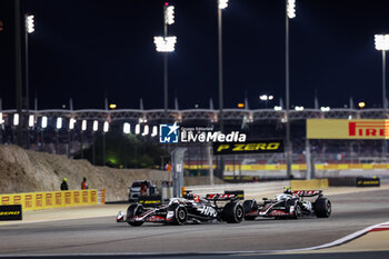 2024-03-02 - 20 MAGNUSSEN Kevin (den), Haas F1 Team VF-24 Ferrari, 27 HULKENBERG Nico (ger), Haas F1 Team VF-24 Ferrari, action during the Formula 1 Gulf Air Bahrain Grand Prix 2024, 1st round of the 2024 FIA Formula One World Championship from February 29 to March 2, 2024 on the Bahrain International Circuit, in Sakhir, Bahrain - F1 - BAHRAIN GRAND PRIX 2024 - FORMULA 1 - MOTORS