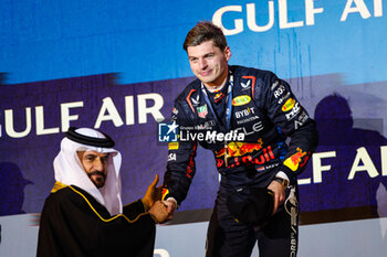 2024-03-02 - VERSTAPPEN Max (ned), Red Bull Racing RB20, BEN SULAYEM Mohammed (uae), President of the FIA, portrait, podium during the Formula 1 Gulf Air Bahrain Grand Prix 2024, 1st round of the 2024 FIA Formula One World Championship from February 29 to March 2, 2024 on the Bahrain International Circuit, in Sakhir, Bahrain - F1 - BAHRAIN GRAND PRIX 2024 - FORMULA 1 - MOTORS