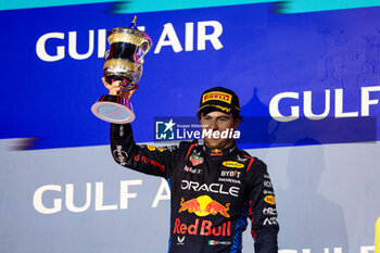 2024-03-02 - PEREZ Sergio (mex), Red Bull Racing RB20, portrait podium during the Formula 1 Gulf Air Bahrain Grand Prix 2024, 1st round of the 2024 FIA Formula One World Championship from February 29 to March 2, 2024 on the Bahrain International Circuit, in Sakhir, Bahrain - F1 - BAHRAIN GRAND PRIX 2024 - FORMULA 1 - MOTORS