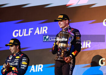 2024-03-02 - VERSTAPPEN Max (ned), Red Bull Racing RB20, portrait podium PEREZ Sergio (mex), Red Bull Racing RB20, portrait during the Formula 1 Gulf Air Bahrain Grand Prix 2024, 1st round of the 2024 FIA Formula One World Championship from February 29 to March 2, 2024 on the Bahrain International Circuit, in Sakhir, Bahrain - F1 - BAHRAIN GRAND PRIX 2024 - FORMULA 1 - MOTORS
