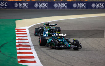 2024-03-02 - 14 ALONSO Fernando (spa), Aston Martin F1 Team AMR24, action 44 HAMILTON Lewis (gbr), Mercedes AMG F1 Team W15, action during the Formula 1 Gulf Air Bahrain Grand Prix 2024, 1st round of the 2024 FIA Formula One World Championship from February 29 to March 2, 2024 on the Bahrain International Circuit, in Sakhir, Bahrain - F1 - BAHRAIN GRAND PRIX 2024 - FORMULA 1 - MOTORS