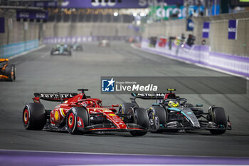 2024-03-09 - 16 LECLERC Charles (mco), Scuderia Ferrari SF-24 and 44 HAMILTON Lewis (gbr), Mercedes AMG F1 Team W15, action during the Formula 1 STC Saudi Arabian Grand Prix 2024, 2nd round of the 2024 Formula One World Championship from March 7 to 9, 2024 on the Jeddah Corniche Circuit, in Jeddah, Saudi Arabia - F1 - SAUDI ARABIAN GRAND PRIX 2024 - FORMULA 1 - MOTORS