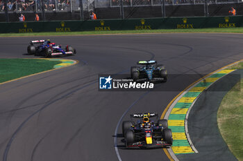2024-03-24 - 11 PEREZ Sergio (mex), Red Bull Racing RB20, action 18 STROLL Lance (can), Aston Martin F1 Team AMR24, action during the Formula 1 Rolex Australian Grand Prix 2024, 3rd round of the 2024 Formula One World Championship from March 22 to 24, 2024 on the Albert Park Circuit, in Melbourne, Australia - F1 - AUSTRALIAN GRAND PRIX 2024 - FORMULA 1 - MOTORS